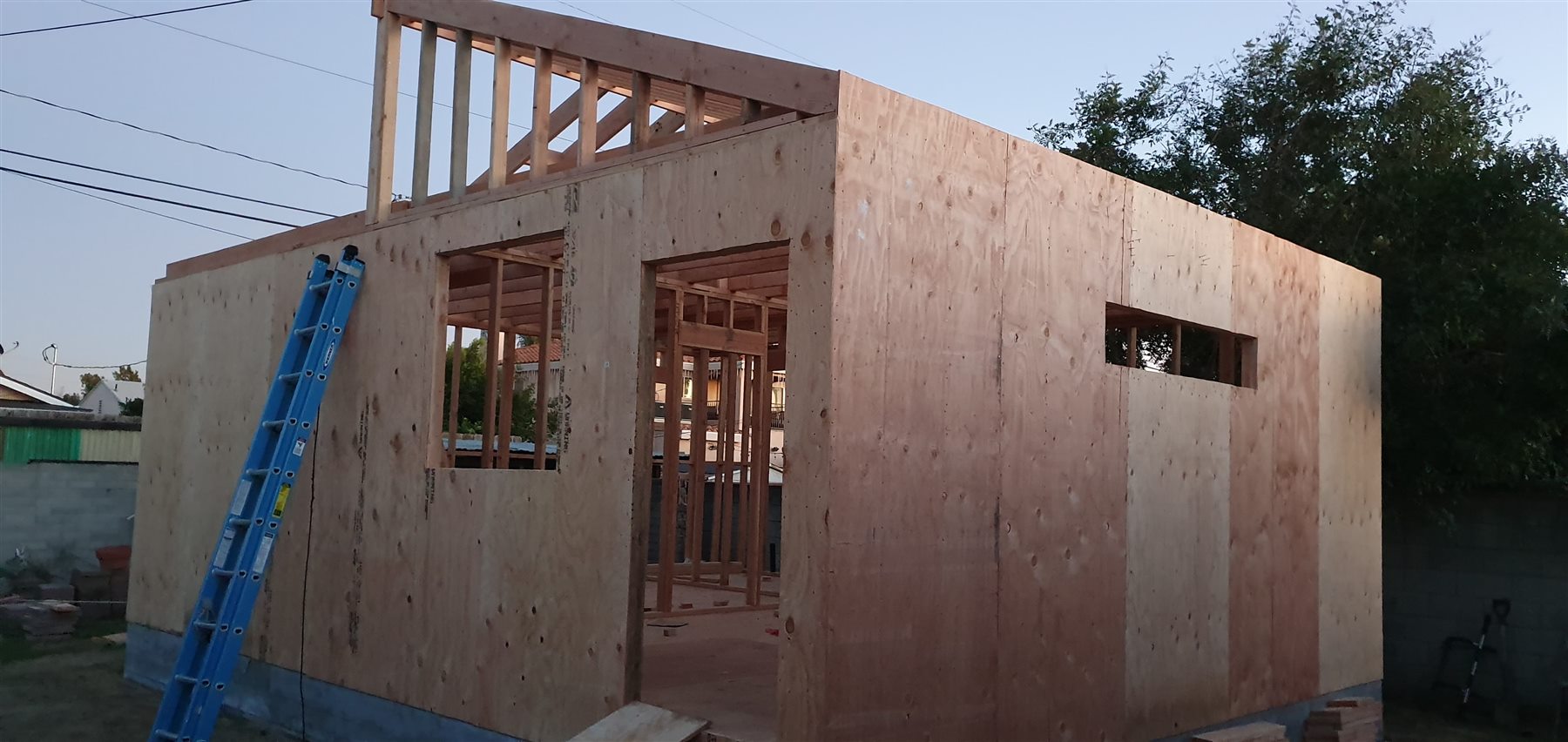 Wall framing and sheathing for a new structure