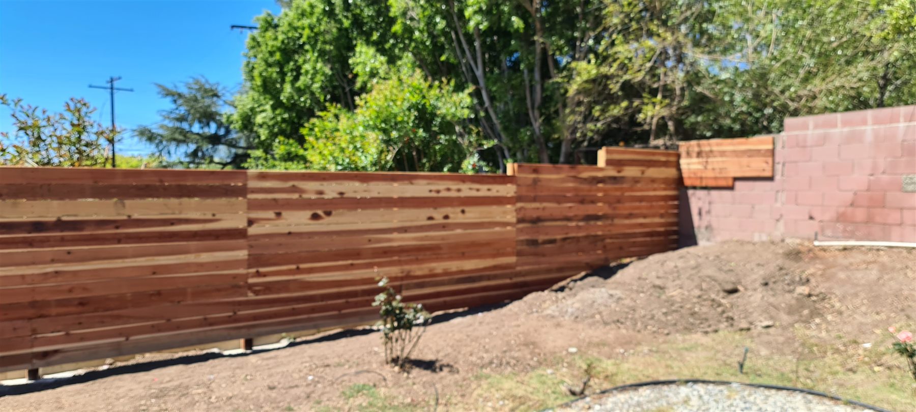 Horizontal wood fence installation